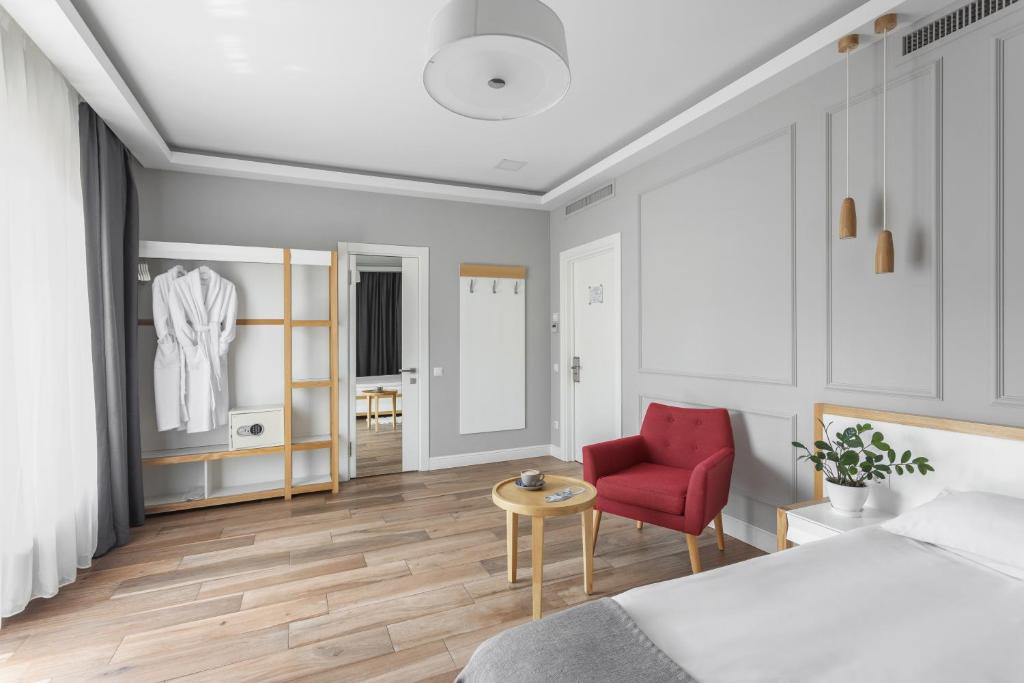 Postel nebo postele na pokoji v ubytování Frapolli 21 Hotel