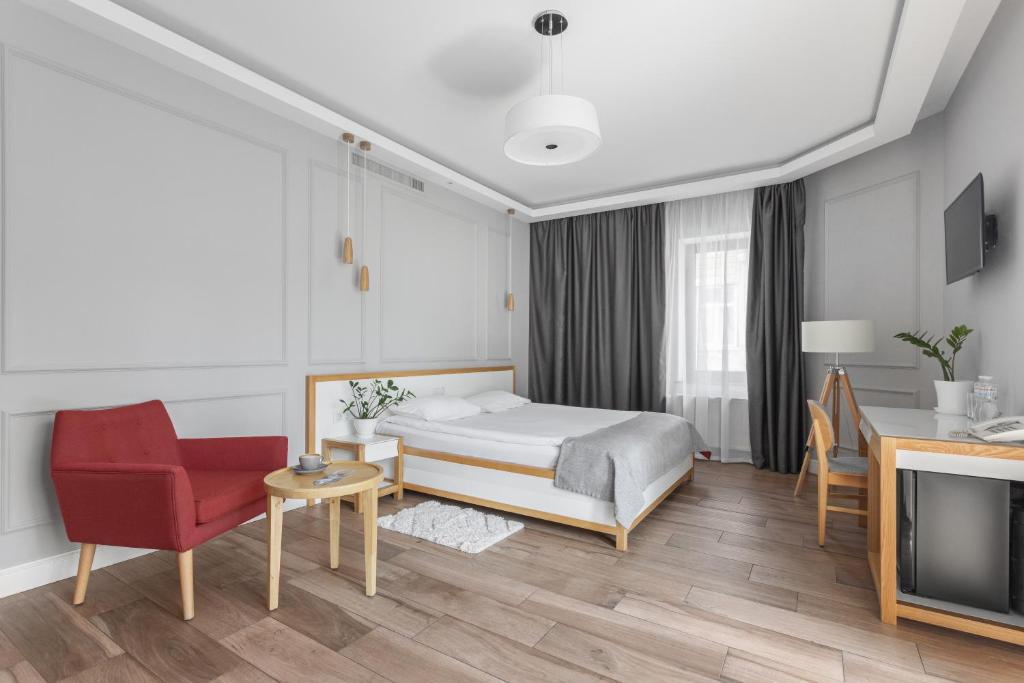 Postel nebo postele na pokoji v ubytování Frapolli 21 Hotel