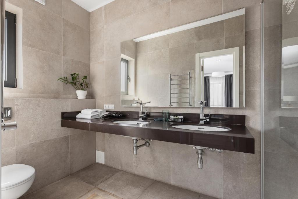 Koupelna v ubytování Frapolli 21 Hotel