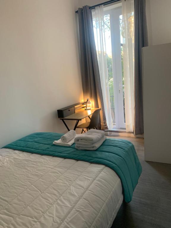 Postel nebo postele na pokoji v ubytování Casona Gorbea Hotel