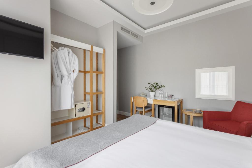 Postel nebo postele na pokoji v ubytování Frapolli 21 Hotel