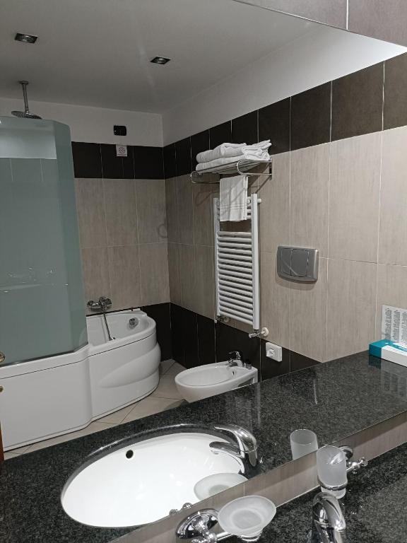 Koupelna v ubytování Green Hotel Ninfa