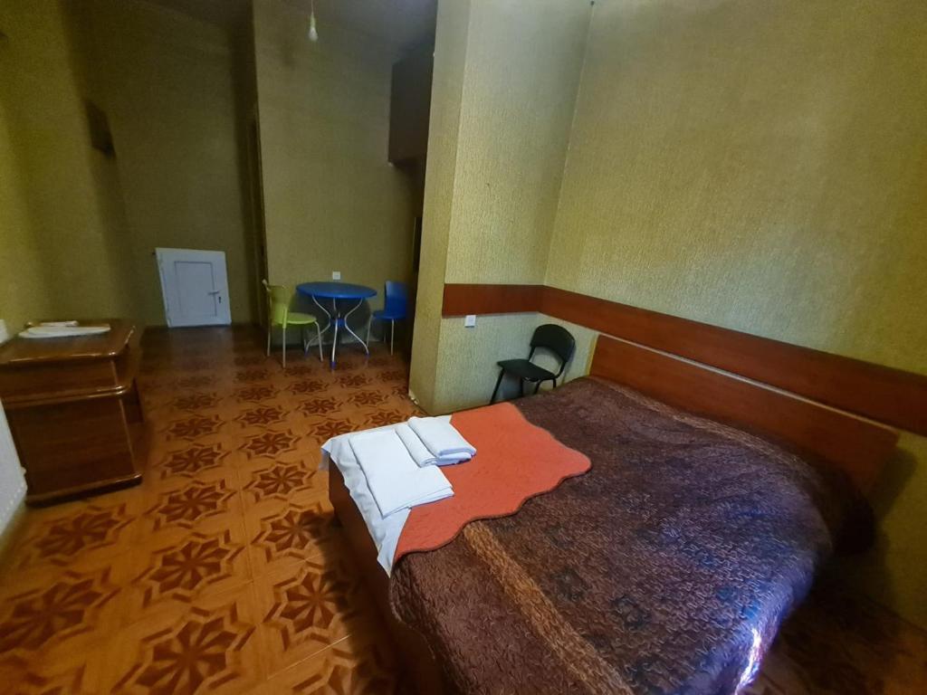 Postel nebo postele na pokoji v ubytování Piano Hotel