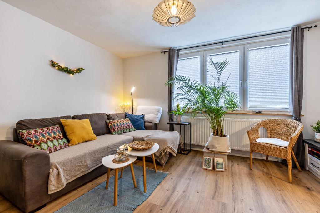 a living room with a couch and a table at La 12 in Bad Urach