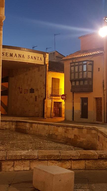 a building with a sign on the side of a street at AREZA Con GARAJE in Zamora