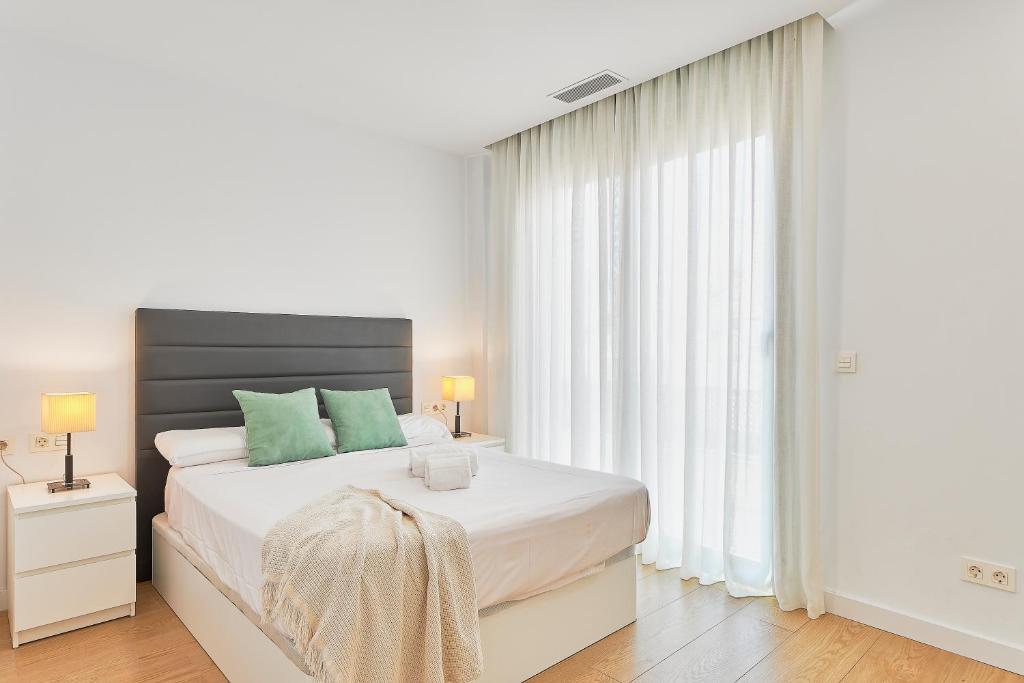 Posteľ alebo postele v izbe v ubytovaní Holidays Elite