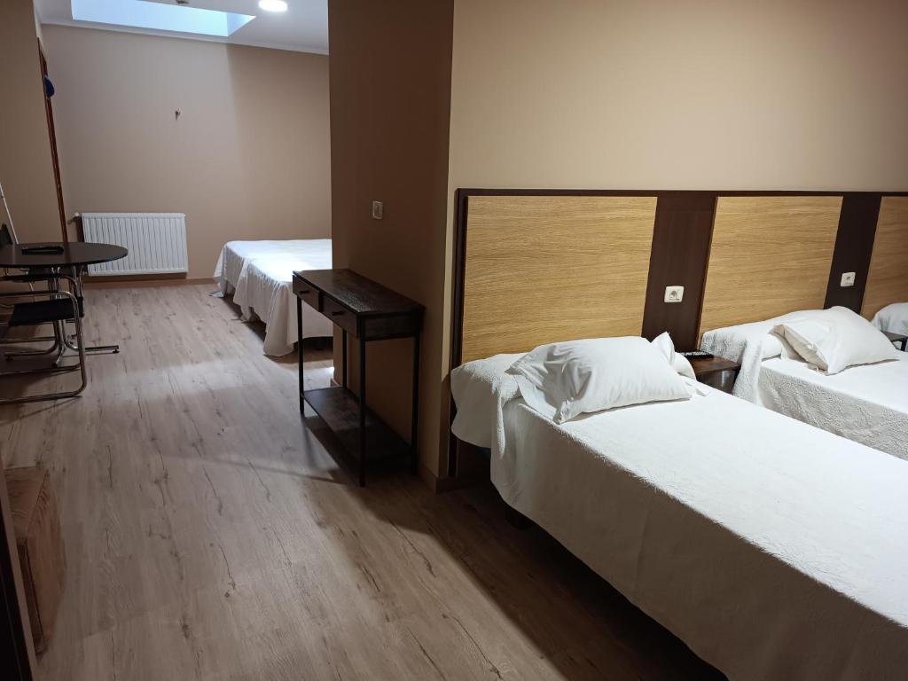 Posteľ alebo postele v izbe v ubytovaní Cruceiro do Monte