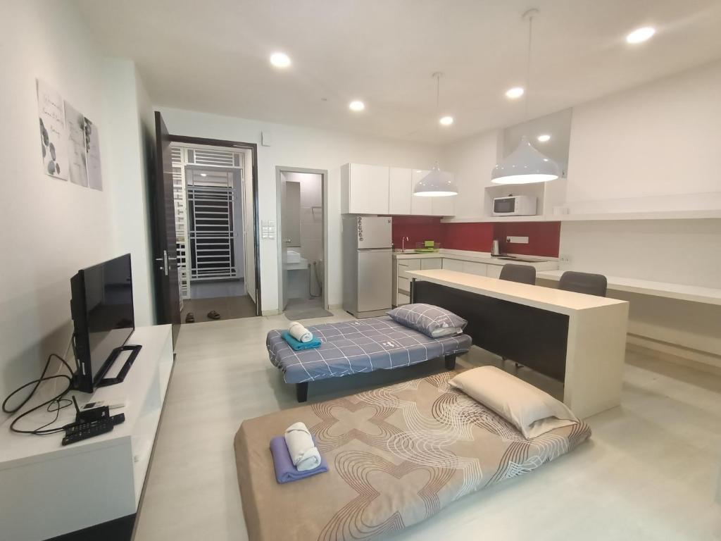 En eller flere senge i et værelse på Deluxe Suites 5, 2-4 pax , Netflix, Georgetown