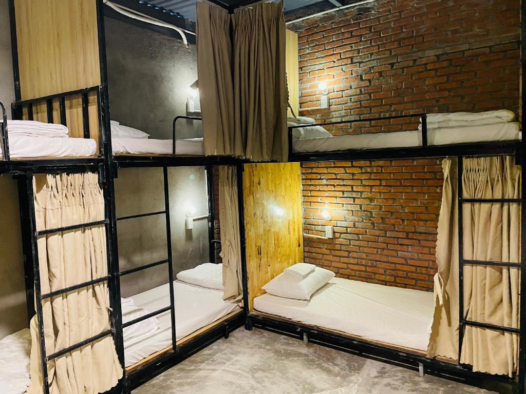 Postel nebo postele na pokoji v ubytování IKIGAI Dorm Hostel - Danang Beach