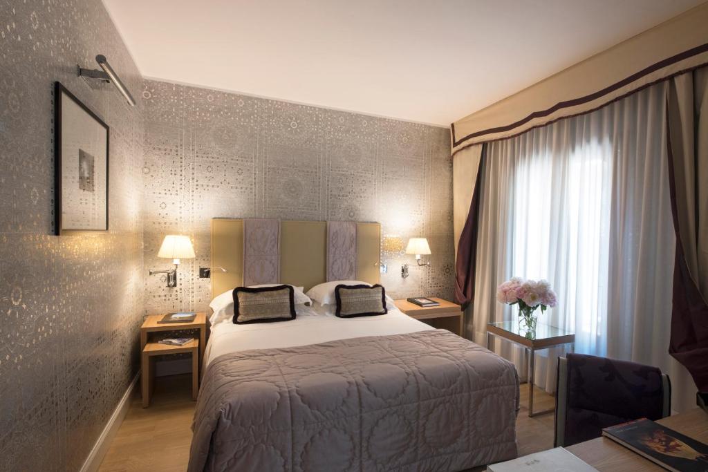Postel nebo postele na pokoji v ubytování Splendid Venice - Starhotels Collezione