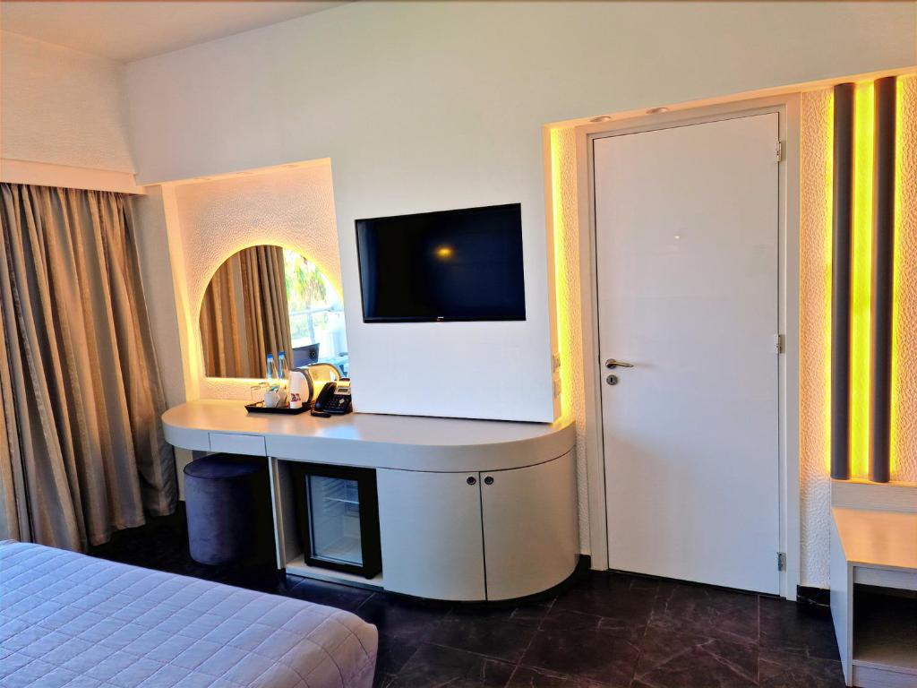Postel nebo postele na pokoji v ubytování Sveltos Hotel