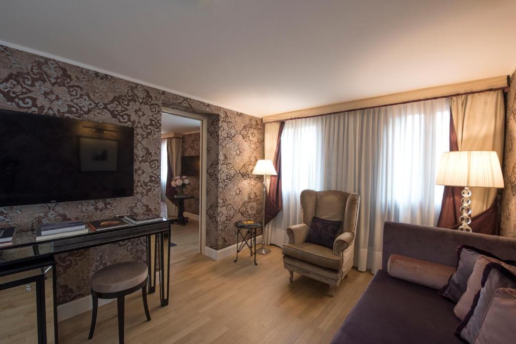 TV a/nebo společenská místnost v ubytování Splendid Venice - Starhotels Collezione