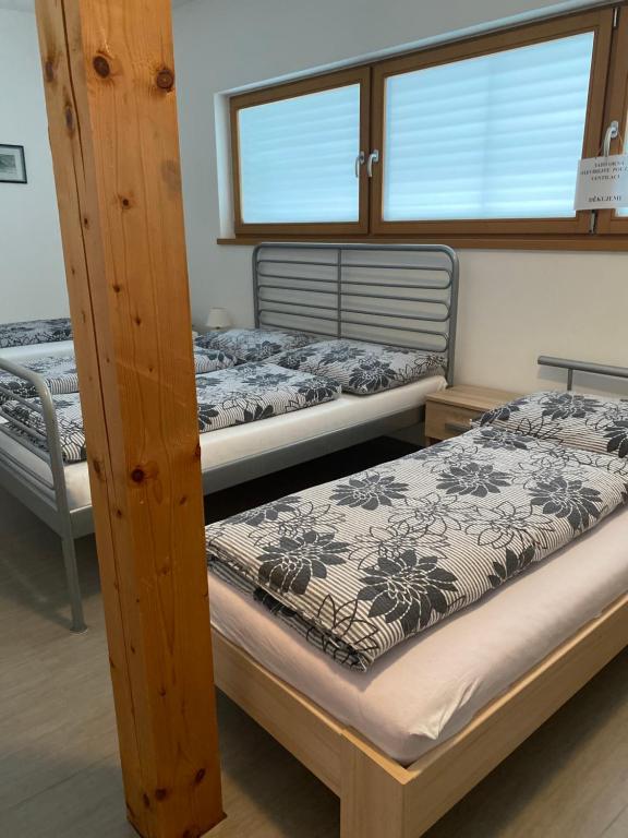 Postel nebo postele na pokoji v ubytování Apartmán Hustopeče