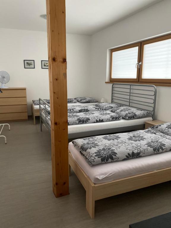 Postel nebo postele na pokoji v ubytování Apartmán Hustopeče