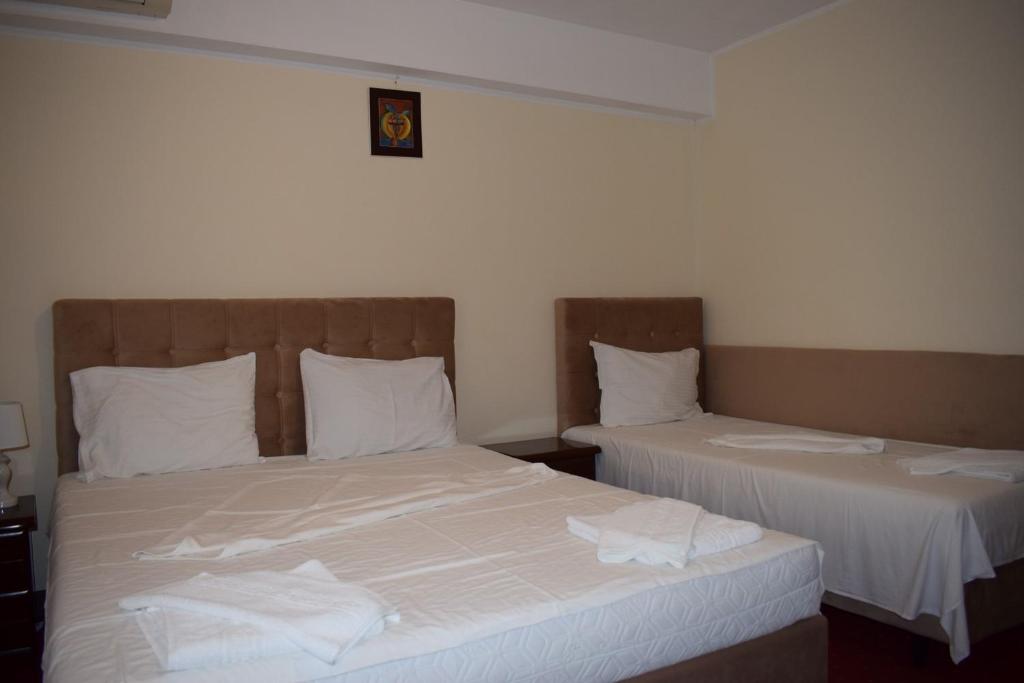 Postel nebo postele na pokoji v ubytování Hotel Ibiza