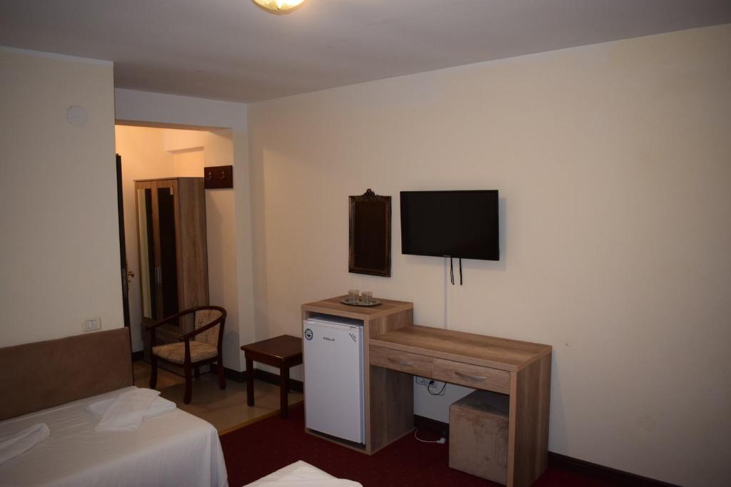 TV a/nebo společenská místnost v ubytování Hotel Ibiza