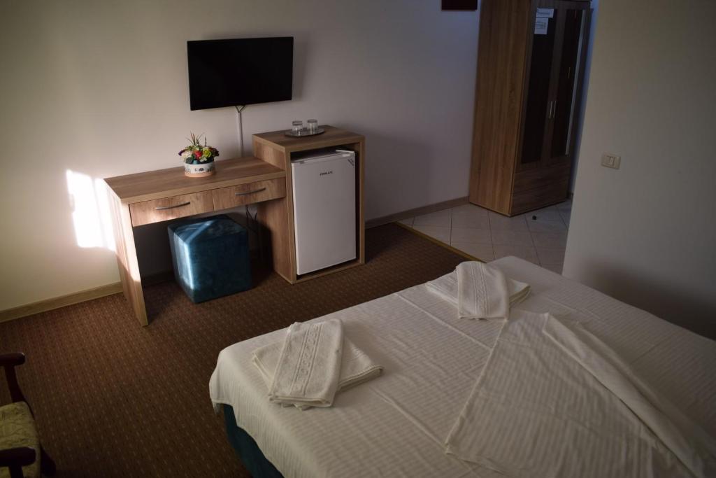 Postel nebo postele na pokoji v ubytování Hotel Ibiza