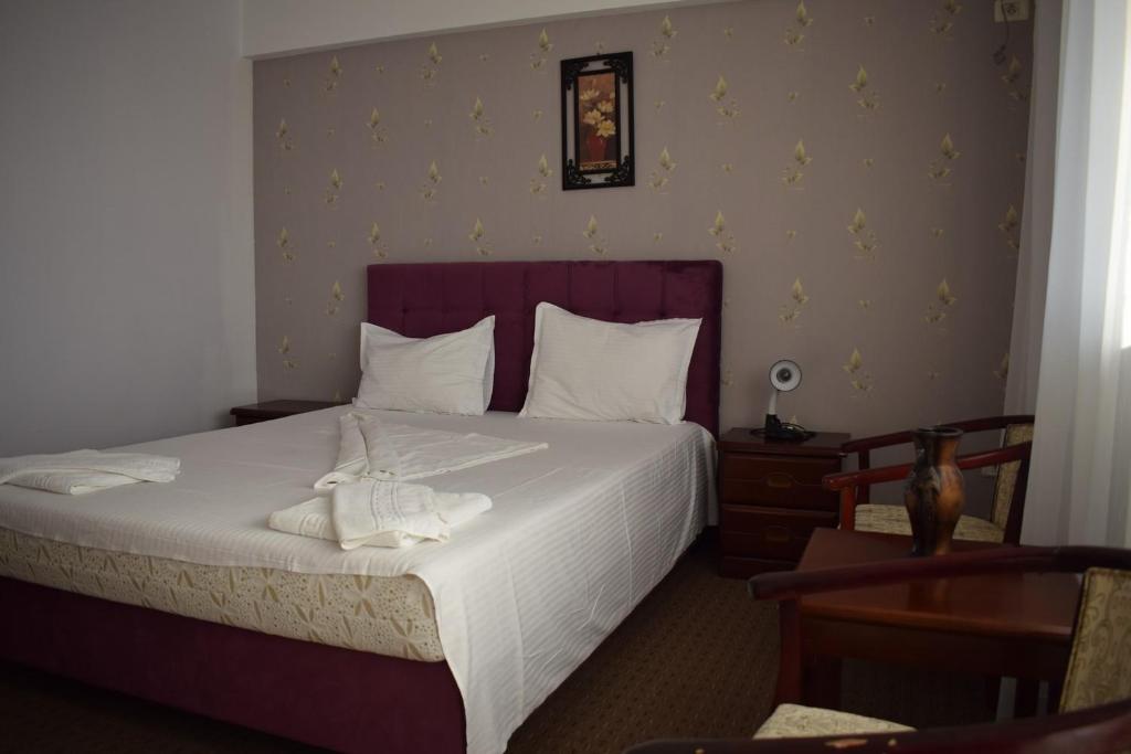 Postel nebo postele na pokoji v ubytování Hotel Ibiza