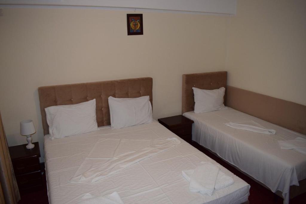Postel nebo postele na pokoji v ubytování Hotel Ibiza