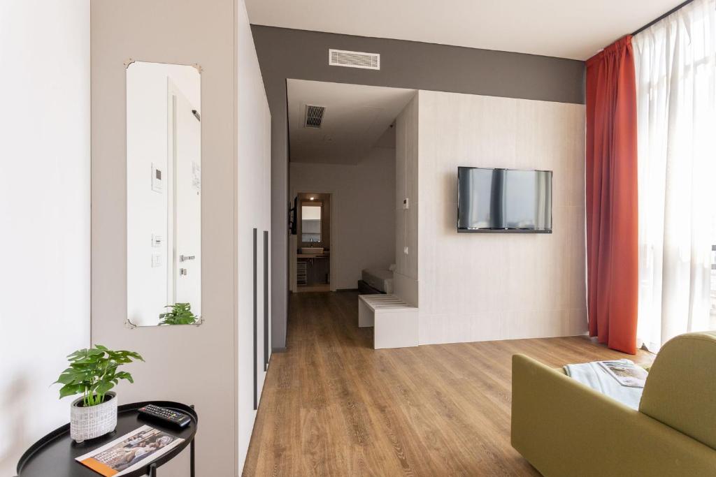 Telewizja i/lub zestaw kina domowego w obiekcie HTM Venice Suite by Halldis