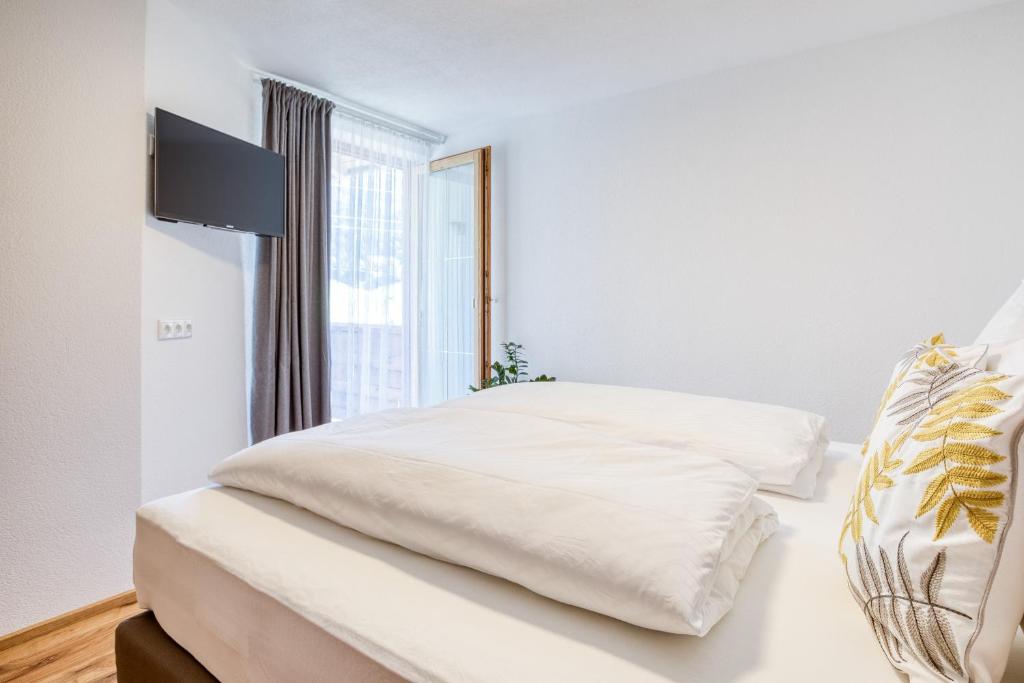 Postel nebo postele na pokoji v ubytování Chill Out Apartments