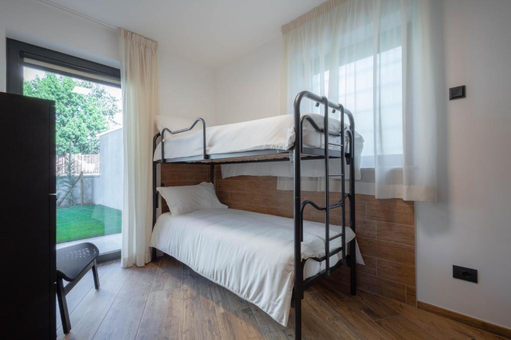Postel nebo postele na pokoji v ubytování San Martin Holidays Home - Stay, Work & Fun