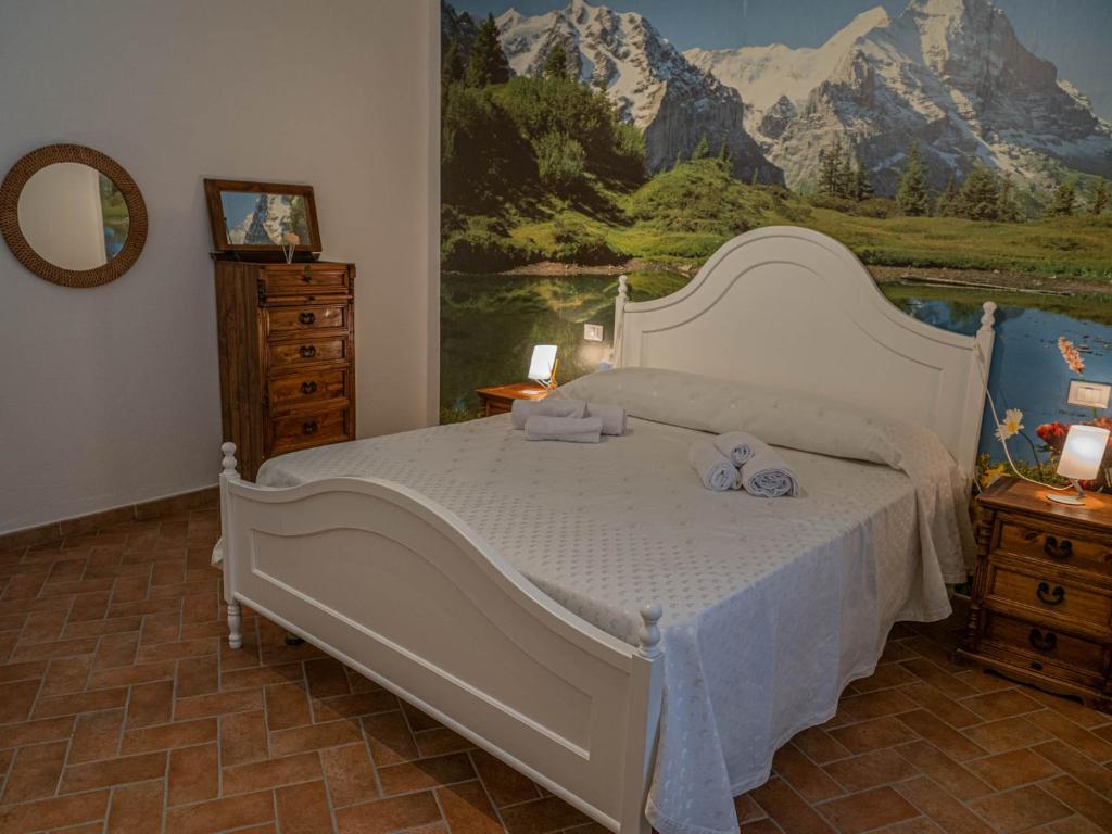 Postel nebo postele na pokoji v ubytování Podere Mona