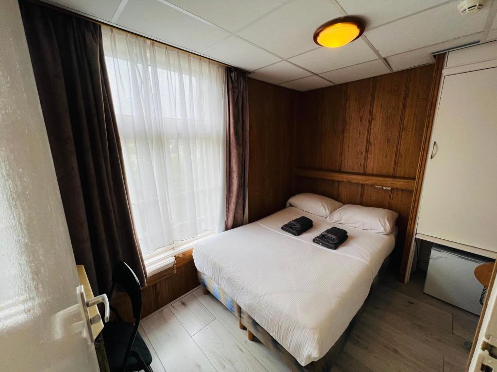 Postel nebo postele na pokoji v ubytování Hotel Sharm