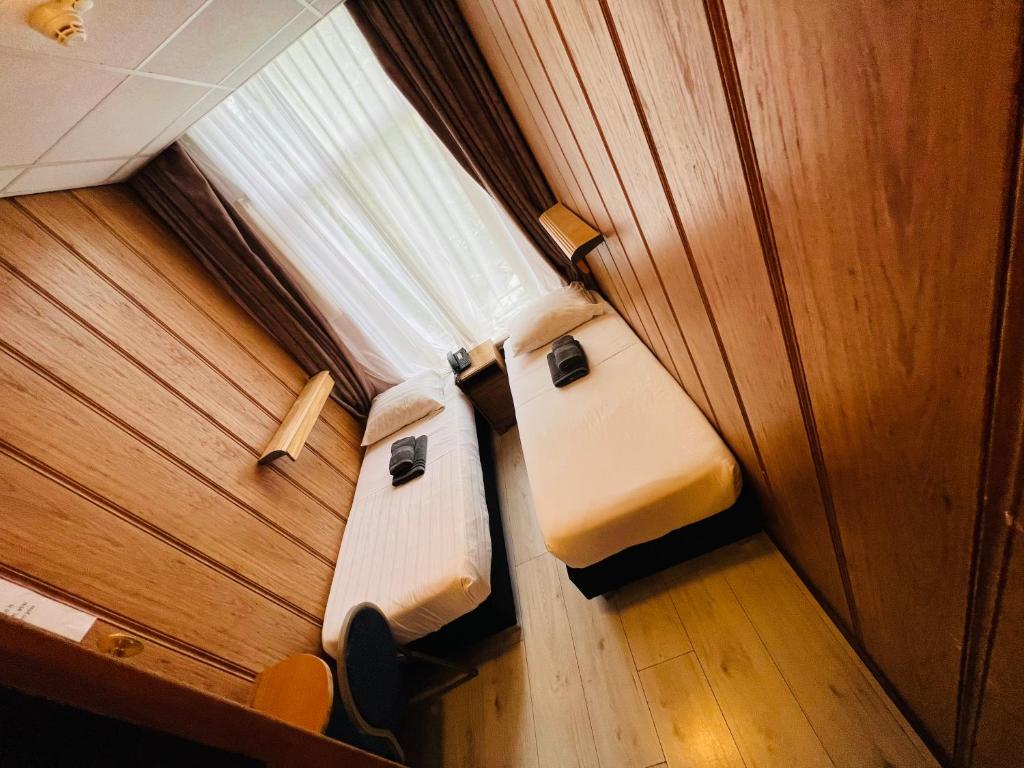 Postel nebo postele na pokoji v ubytování Hotel Sharm