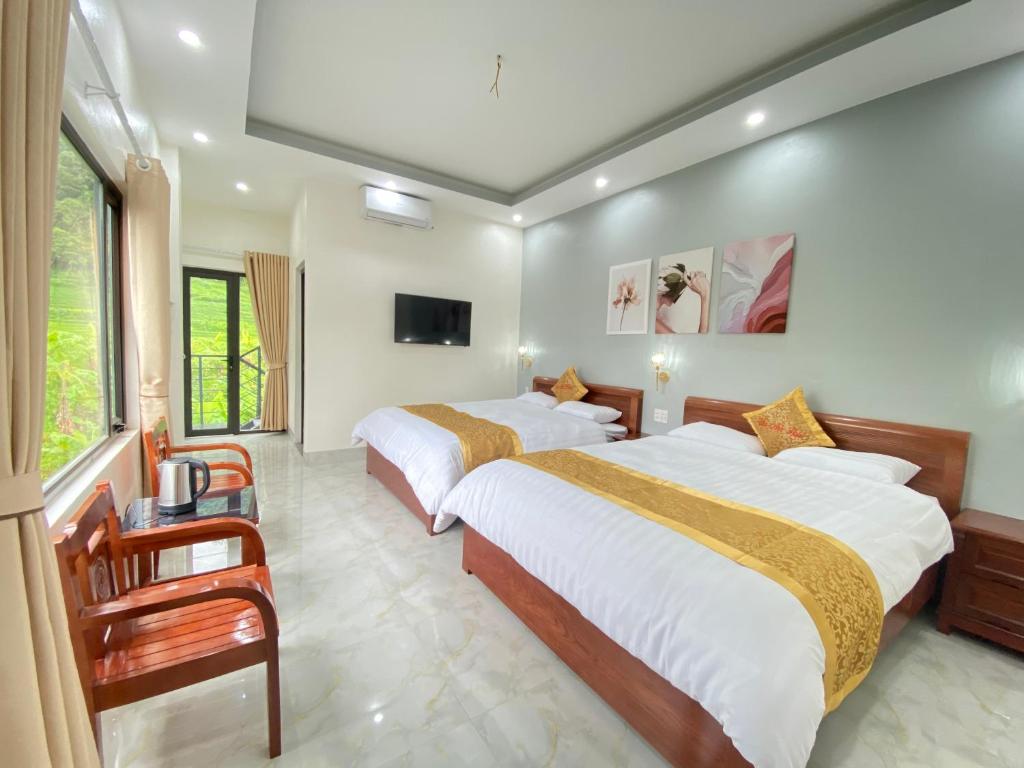 Postel nebo postele na pokoji v ubytování Van Anh Hotel - Restaurant
