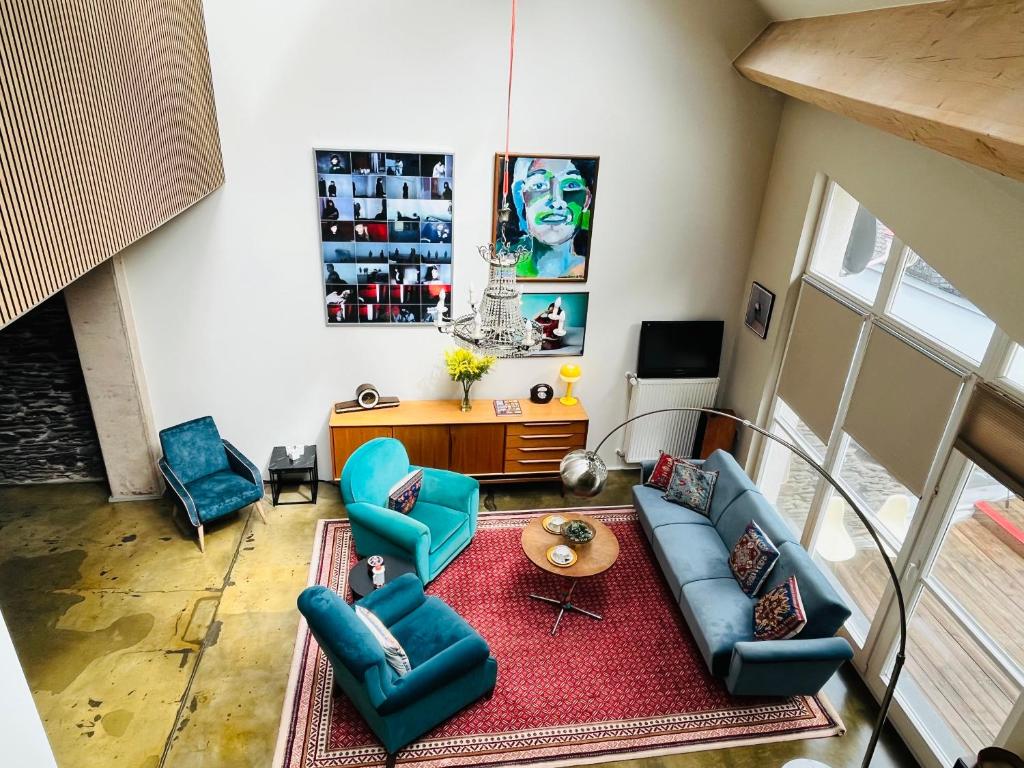 TV a/nebo společenská místnost v ubytování Ancien Cinema Loft