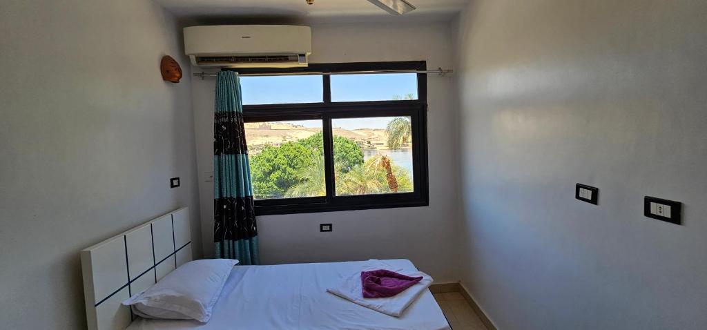 Basmatic Nubian Guest House客房内的一张或多张床位