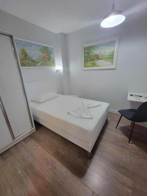 Postel nebo postele na pokoji v ubytování Nuestra Casa