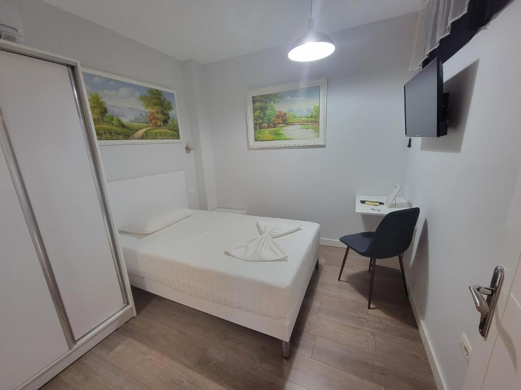 Postel nebo postele na pokoji v ubytování Nuestra Casa