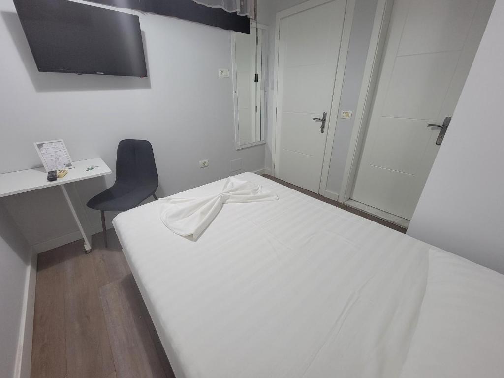 Postel nebo postele na pokoji v ubytování Nuestra Casa