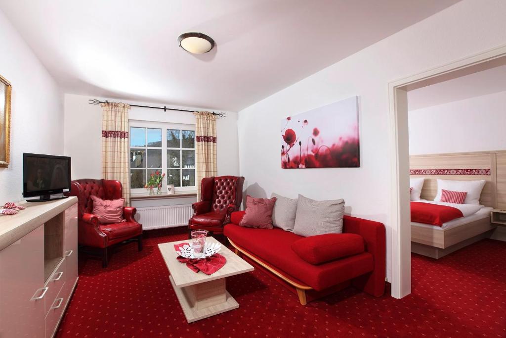 TV a/nebo společenská místnost v ubytování Hotel Garni Dorfkammer
