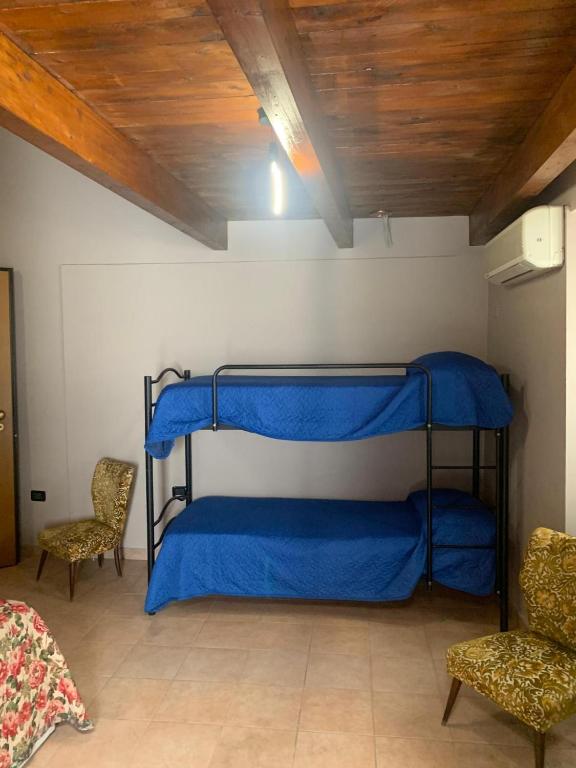 Postel nebo postele na pokoji v ubytování CD Romanello (Mura S. Cataldo)