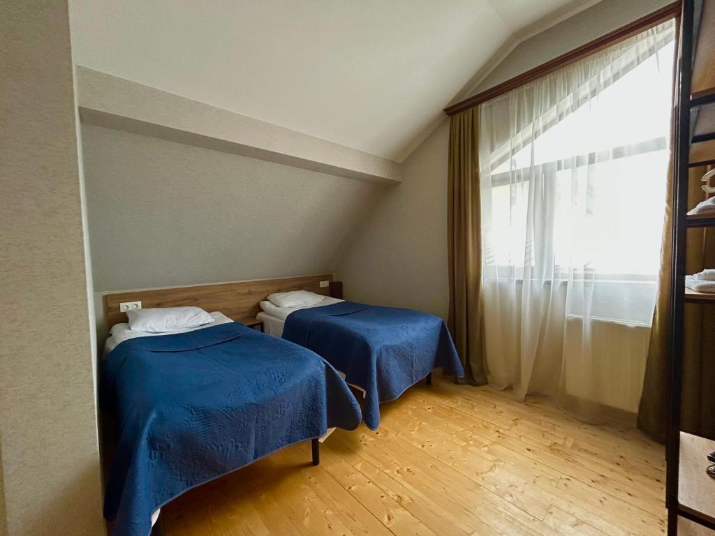 Postel nebo postele na pokoji v ubytování Aldema