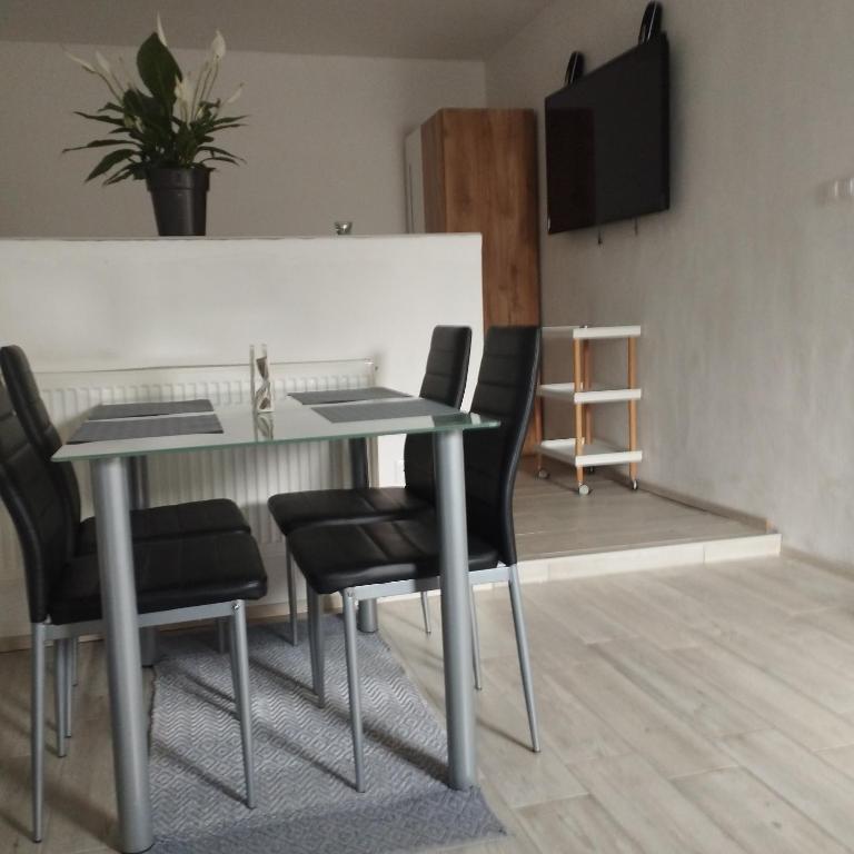 TV a/nebo společenská místnost v ubytování Apartmány 77