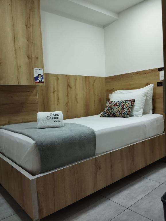 Postel nebo postele na pokoji v ubytování Hotel Park Caribe
