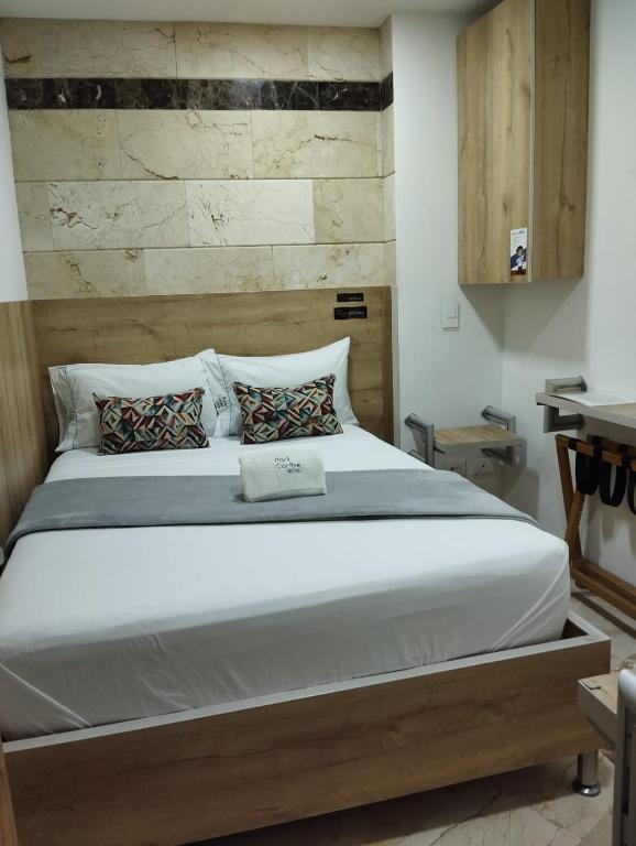 Postel nebo postele na pokoji v ubytování Hotel Park Caribe