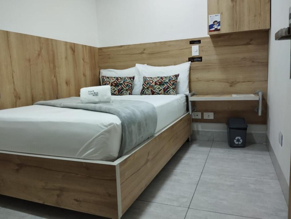 Postel nebo postele na pokoji v ubytování Hotel Park Caribe