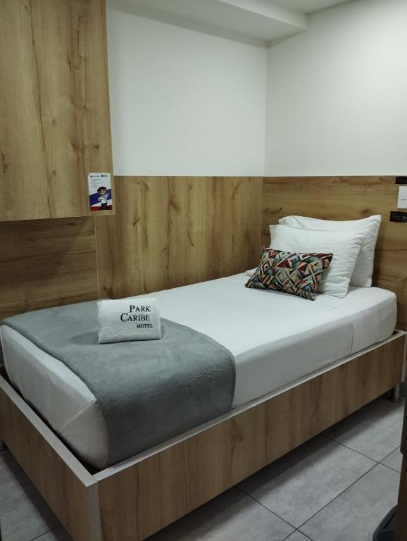 Postel nebo postele na pokoji v ubytování Hotel Park Caribe