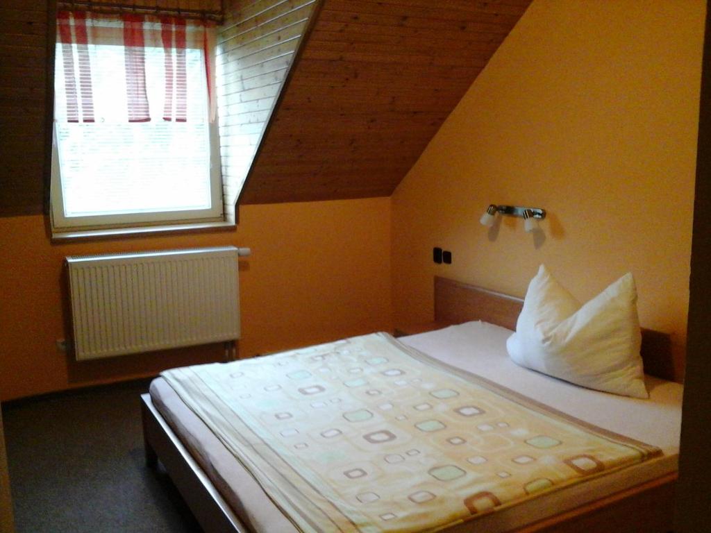 Postel nebo postele na pokoji v ubytování Penzion Adam - Makov