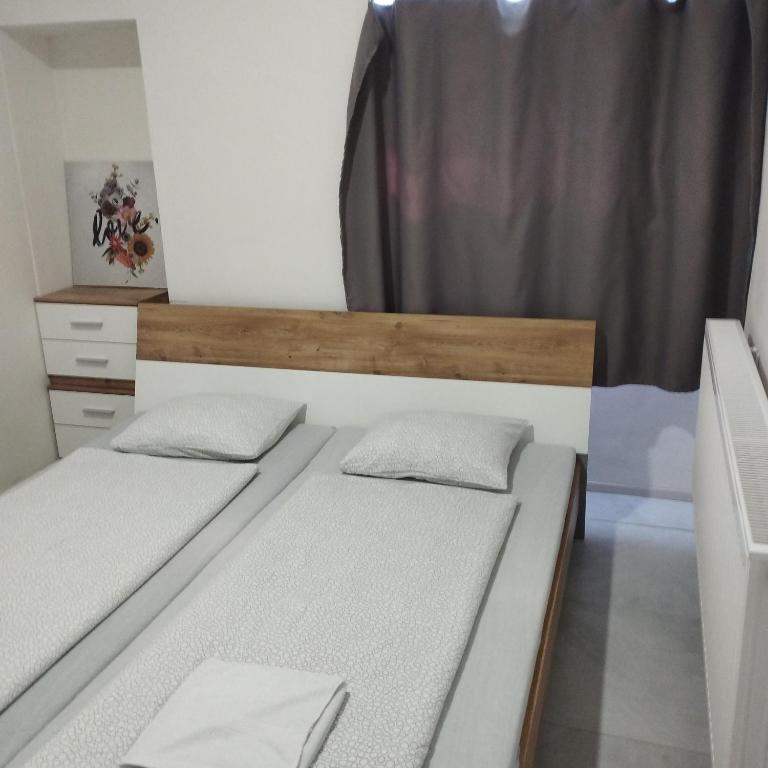Postel nebo postele na pokoji v ubytování Apartmány 77