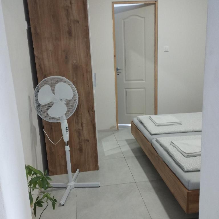 Postel nebo postele na pokoji v ubytování Apartmány 77
