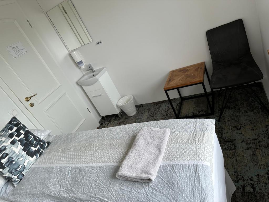 Postel nebo postele na pokoji v ubytování Guesthouse Dyngja