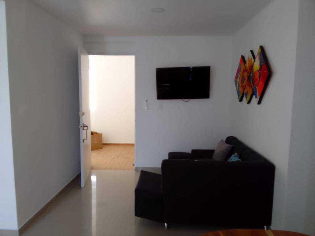 TV/trung tâm giải trí tại Hermoso Apartamento en Caribe Campestre