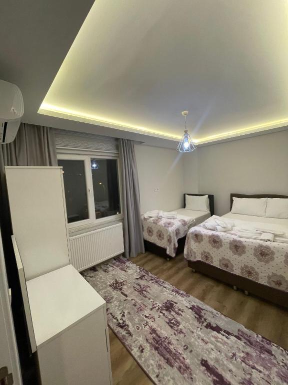 Postel nebo postele na pokoji v ubytování Sulduz Hotel Apart & SPA