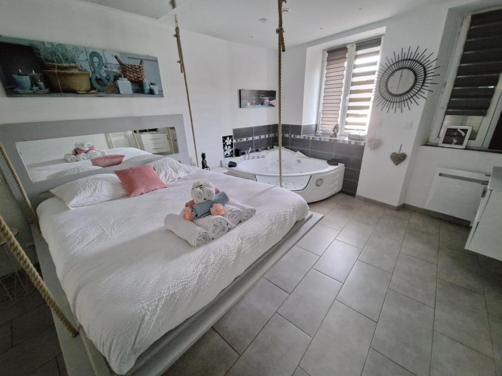 Ένα ή περισσότερα κρεβάτια σε δωμάτιο στο Appartement Lit Suspendu